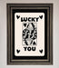 Lucky You Beige Black Framed Print - Hi Society